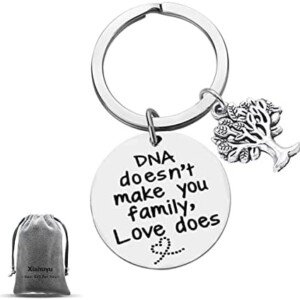 DNA Doesn't Make You Family Keychain